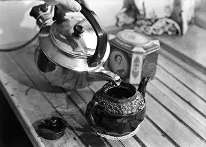 Boiling Prints: Making tea, c1955. Creator: Arthur Charles Kirby Ware