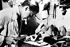 Making wooden shoe soles, German-occupied Paris, February 1941