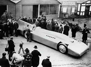 Garage Prints: Malcolm Campbell being photographed in Bluebird, 1935. Creator: Unknown
