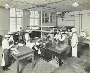 Male cookery students at work in the kitchen, Westminster Technical Institute, London, 1910