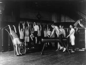 Gymnasium Prints: Male students exercising, some with equipment