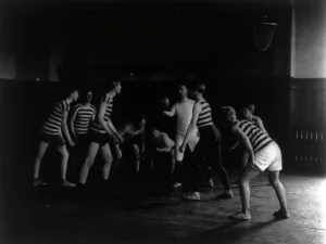Gymnasium Prints: Male students playing basketball