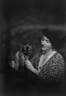 Feline Prints: Malvina Hoffman with cat, portrait photograph, 1933 June 27. Creator: Arnold Genthe