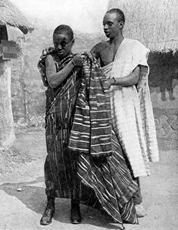 Peoples Of The World In Pictures Gallery: A man and a boy from the Ashanti people, Ghana, Africa, 1936.Artist: LNA Images