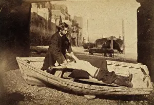 Lifesaving Prints: A man and a boy with bare torso in a rowing boat grounded on a beach