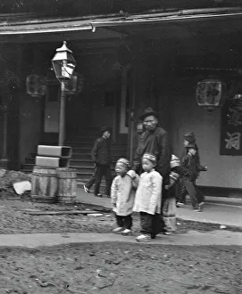 Street Lamp Prints: Man and two children crossing a street