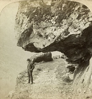 Underwood Gallery: Man on a cliff overlooking Naeroyfjord, Sogne, Norway.Artist: Bert Underwood