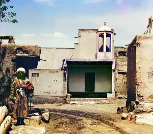 Central Asian Prints: Man in courtyard, between 1905 and 1915. Creator: Sergey Mikhaylovich Prokudin-Gorsky