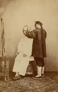 Man Examining Other Man, 1870s. Creator: Unknown
