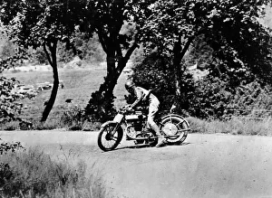 Norton Prints: A man on a Norton bike taking part in the Belgian Grand Prix, 1924