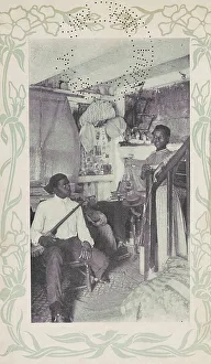 Banjo Player Prints: Man seated with banjo next to woman at stairs, 1903. Creator: Camera Club