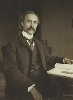 Kasebier Gertrude Prints: Man seated with table and book, 1896-1898. Creator: Gertrude Kasebier