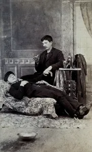 Taking Pulse Prints: A man taking the pulse of another man, between 1800 and 1899. Creator: Unknown