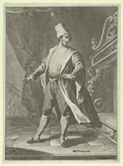 Man in Venetian costume standing before a large fireplace, right arm outstretched..., ca. 1770-1800. Creator: Anon