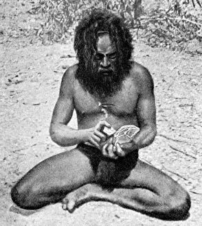 Images Dated 24th November 2007: A man from the Warramunga tribe making a stone axe head, Australia, 1922.Artist: Spencer and Gillen