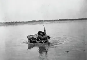 Coracle Prints: Mandan bull boat, c1908. Creator: Edward Sheriff Curtis