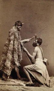 Demonstrating Prints: Two Maori men, simulating armed attack with a hatchet and a spear(?)