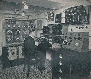 A Marconi wireless operator receiving wireless messages as the Empress of Britain crosses the Atlan