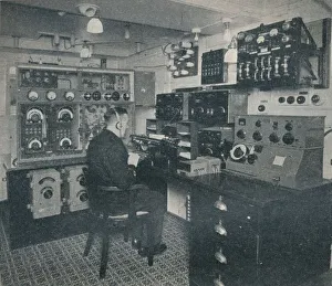 Guglielmo Prints: A Marconi wireless operator receiving wireless messages as the Empress of Britain crosses the Atlan
