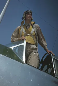 Palmer Alfred T Prints: Marine Corps lieutenant studying glider piloting at Page Field