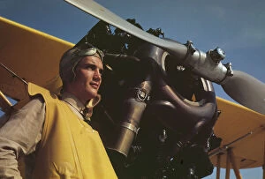 Marine Corps Gallery: Marine lieutenant by the power plane which tows...at Page Field, Parris, Island, S.C. 1942