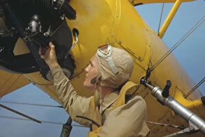 Aeroplane Gallery: Marine lieutenant by the power towing plane for the gliders at Parris Island, S.C. 1942