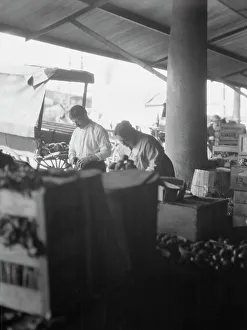 Southern Prints: Market scene, New Orleans, between 1920 and 1926. Creator: Arnold Genthe