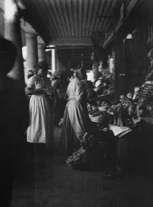 Southern Prints: Market scene, New Orleans, between 1920 and 1926. Creator: Arnold Genthe