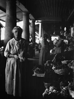 Southern Prints: Market scene, New Orleans, between 1920 and 1926. Creator: Arnold Genthe