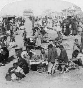 A market in the Tartar (northern) city, looking toward Drum Tower, Peking (Beijing), China, 1901 A market in the Tartar (northern) city, looking toward Drum Tower, Peking (Beijing), China, 1901