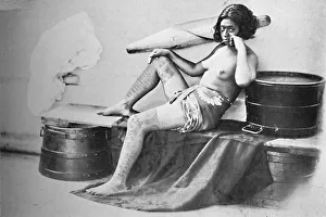 A Marquesa woman with the lower part of the legs fully tattooed, 1902 A Marquesa woman with the lower part of the legs fully tattooed, 1902