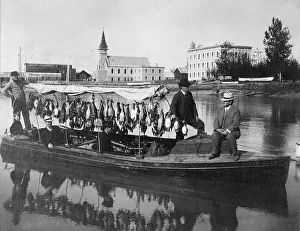 Fairbanks Alaska United States Prints: Marshall Erwin in front of a boat containing a kill of ducks