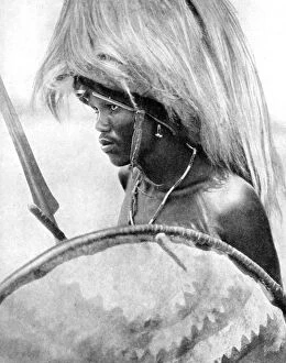 Peoples Of The World In Pictures Gallery: A Masai warrior, Africa, 1936.Artist: Wide World Photos