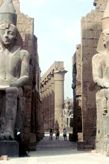 Massive Ancient Egyptian statues and columns at Luxor, Egypt