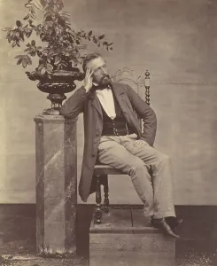 Mathias Prints: [Mathias Housermann seated with elbow on pedestal holding a vase of flowers]