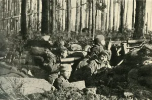 Maxim gun in action on the British Front, First World War, 1915, (c1920). Creator: Unknown