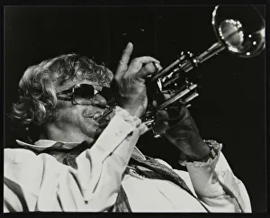 Blowing Prints: Maynard Ferguson playing the trumpet. Artist: Denis Williams