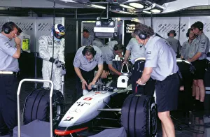 Garage Prints: McLaren MP4 13, Mika Hakkinen in pits during practice for 1998 British Grand Prix
