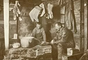 Blubber Collection: Meares and Demetri at the Blubber Stove in the Discovery Hut, 3 November 1911, (1913)