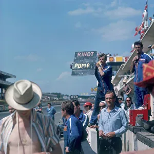 Pits Prints: A mechanic holding up a sign, French Grand Prix, Le Mans, France, 1967