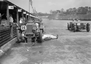 Lea Francis Prints: Mechanic working on a Lea Francis J type at the JCC Double Twelve race