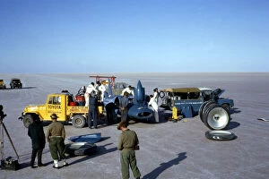 Mechanics fuelling Bluebird CN7 for World Land Speed Record attempt, Lake Eyre, 1964