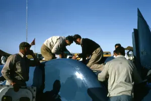 Mechanics working on Bluebird CN7 for World Land speed record attempt, Lake Eyre, 1964 Mechanics working on Bluebird CN7 for World Land speed record attempt, Lake Eyre, 1964