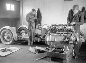 Raymond Mays Gallery: Mechanics working on Raymond Mays 4500 cc Invicta car. Artist: Bill Brunell