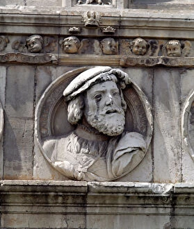 Medallion in stone on the facade of the old Hospital of San Marcos representing King