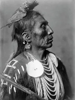 Apsaroke Prints: Medicine Crow-Apsaroke, c1908. Creator: Edward Sheriff Curtis