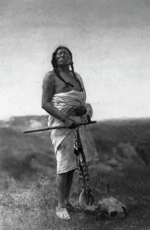 The Medicine Man (Slow Bull), c1907. Creator: Edward Sheriff Curtis