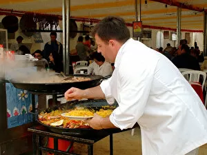 Cuisine Gallery: Mediterranean cuisine, chef preparing a paella, Feria de Abril (April Fair) 2002