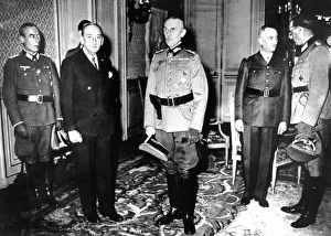Minister Of Defence Prints: Meeting between German officers and French Vichy government officials, France, 1940-1944