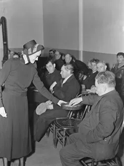 Charity Gallery: Meeting opens with taking the collection, Salvation Army, San Francisco, California, 1939